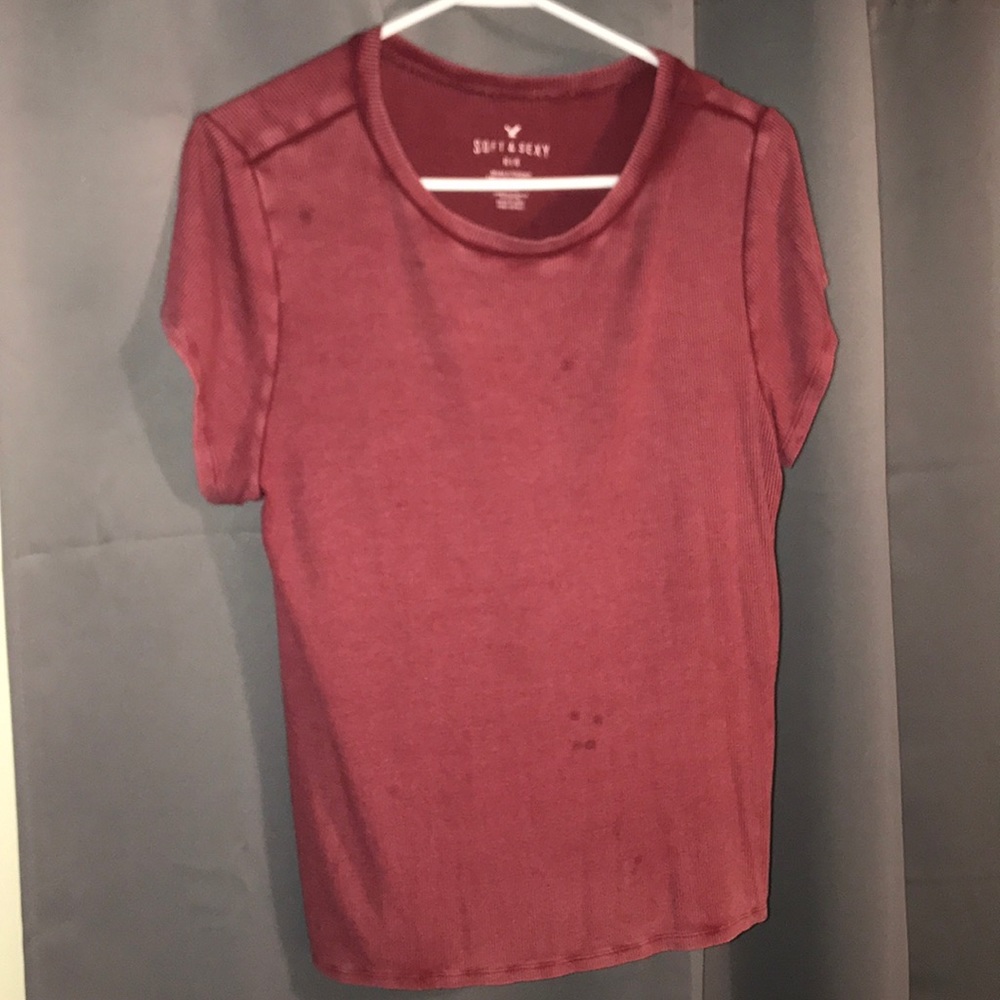 Washed out red t-shirt.